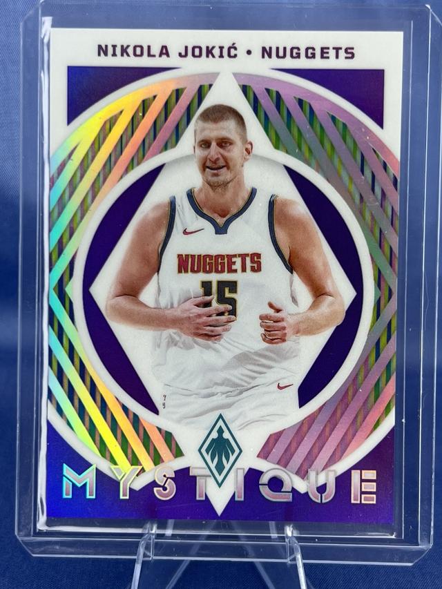 2023-24 Panini Phoenix Basketball Nikola Jokic Fire Forged Purple /75 #4