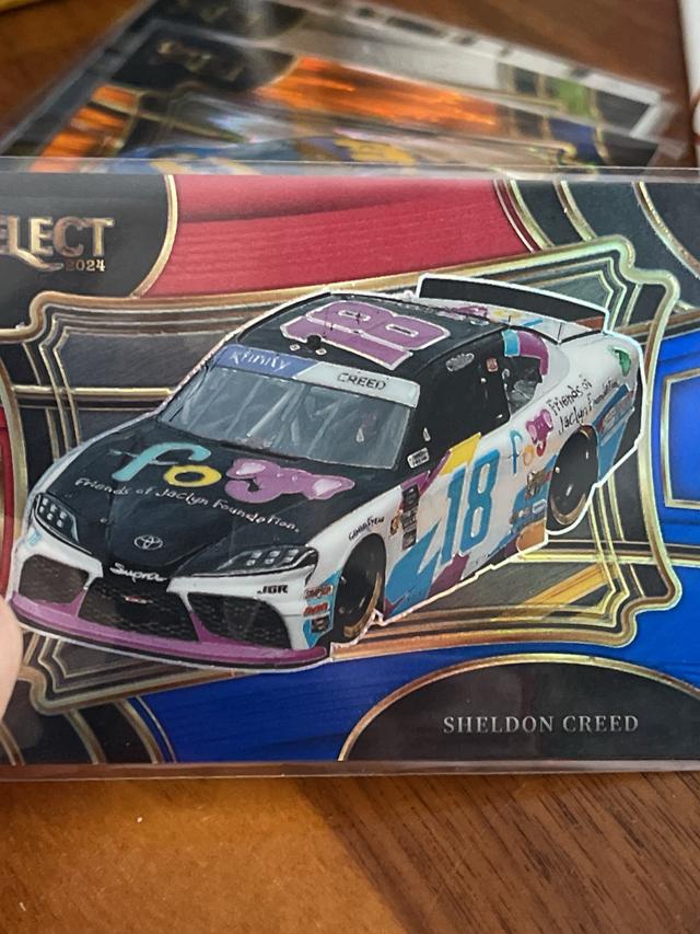 2024 Panini Select NASCAR Sheldon Creed Pit Road Red and Blue Prizms /149 #174