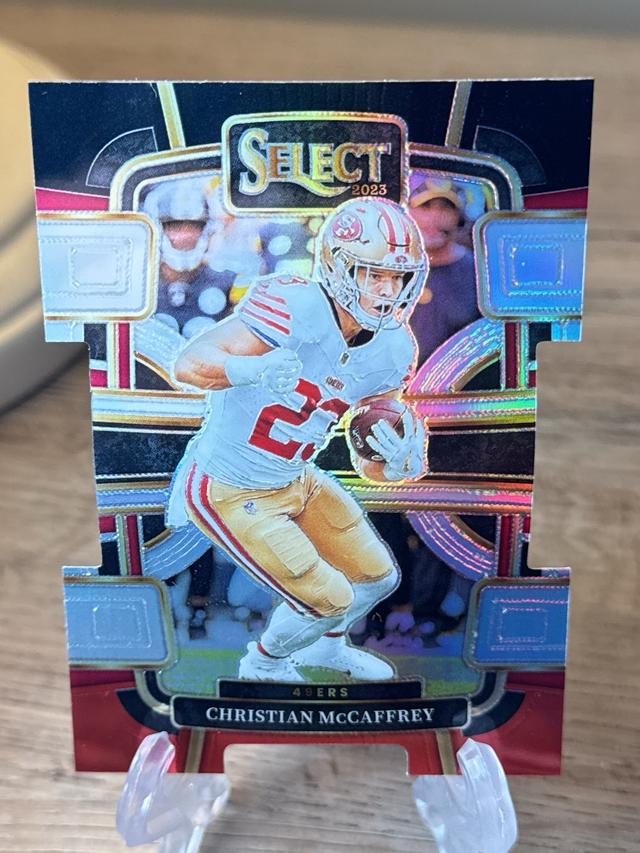 2023 Panini Select Christian McCaffrey ﻿Base Set Black/Red Prizms Die #88