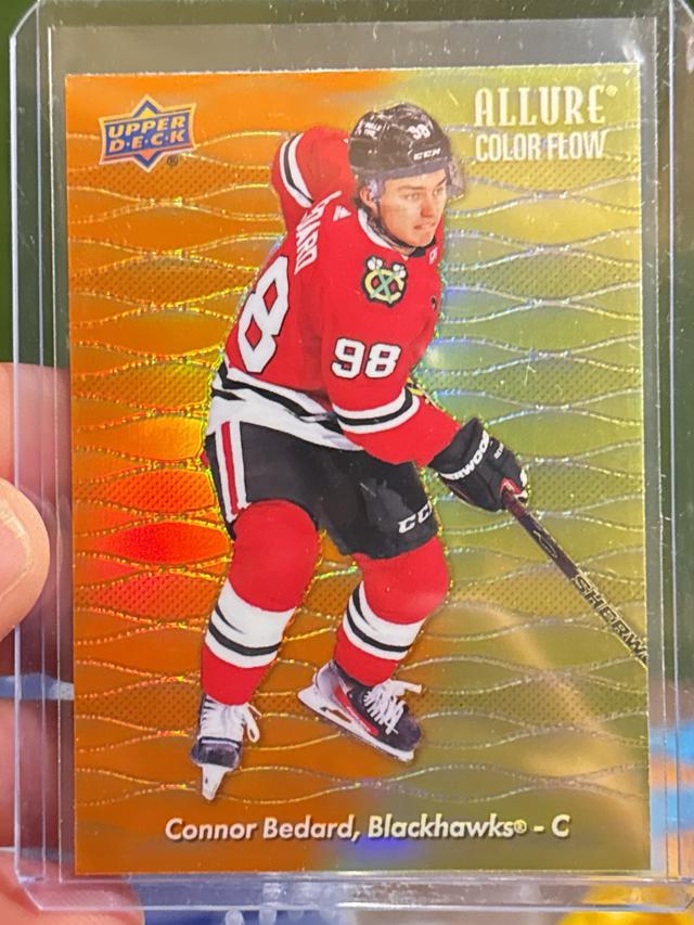 2023-24 Upper Deck Allure Connor Bedard ﻿Color Flow Orange-Yellow #CF-16