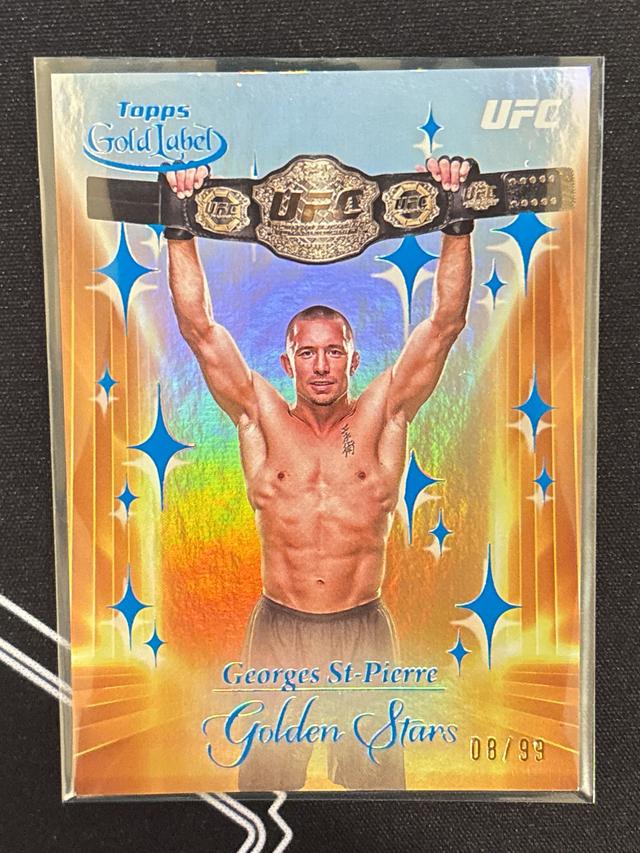 2024 Topps Gold Label UFC Georges St-Pierre Golden Stars Blue /99 #GS-10 Middleweight